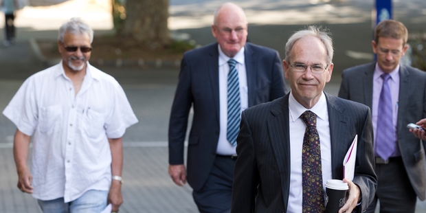 Len Brown, front, arrives at the special meeting yesterday with councillors, from left, Arthur Anae, George Wood and Callum Penrose. Photo / Greg Bowker