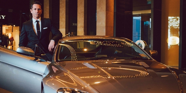 Michael Guerin takes an Aston Martin for a spin during a James Bond-themed weekend in Melbourne. Photo / Roberto Seba