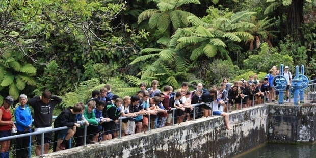 Students and tramping club members at the Waitahinga Dam. Photo/Supplied