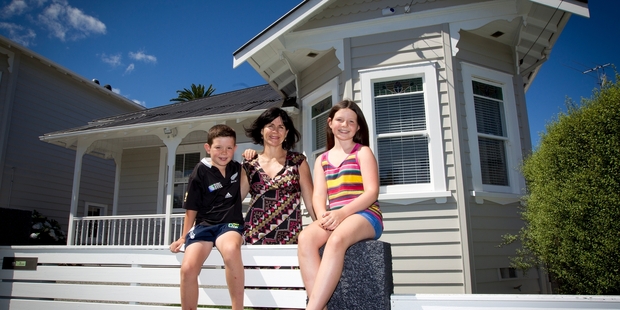 Kerryn Adamson and her children, Tomas and Georgina Ogden, love living in their character Grey Lynn villa, which has been renovated and insulated. Photo / Sarah Ivey