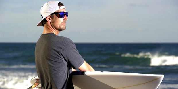 Papamoa surfer Sam Malcolm warns beach-goers to be aware of rips and strong currents after he saved a teenager from drowning. Photo/George Novak.