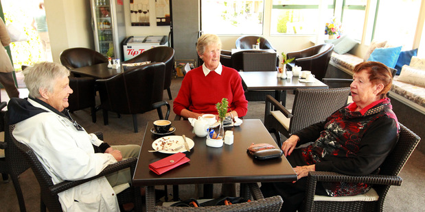 Annette Menzies, Jo Eyles from Hastings, Chris Hough pictured in the cafe during the Christmas party at Summerset in the Vines Retirement Village in Havelock North. Photo / APN