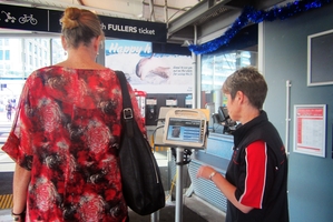 Ann Maree Jago passes through a ferry ticketing booth. Photo / Kirsty Wynn