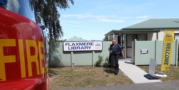 Fire Service staff leave the Flaxmere Library's temporary site in Swansea Rd, after a chemical alert. Photo/Duncan Brown