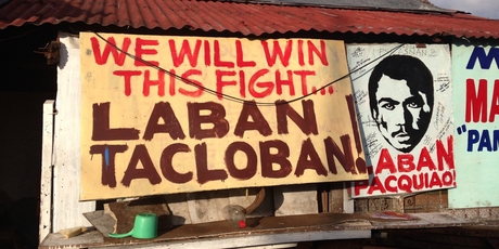 A sign on the streets of Tacloban is evidence of the people's grit and fight.