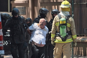 Ganiji is taken away. Photo / AP