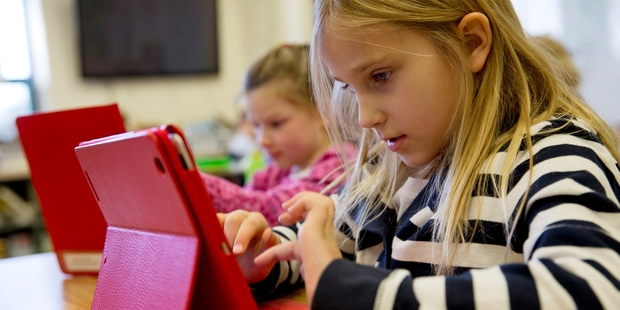 Children around the world have embraced the iPad. Photo / AP