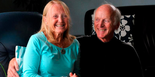 Dunedin resident Carolyne Smith rests her injured leg while sharing the story of her struggle, supported by her husband David Smith. Photo / Craig Baxter
