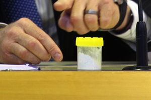 A container of the medication was shown in court.