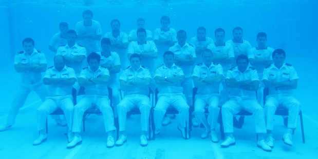 It took three tries to get the shot of the team posing in the Devonport Naval Base swimming pool on the North Shore. Photo / Chris Weissenborn