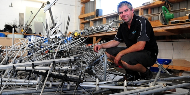 Todd Harding from Alliance AV shows the number of aerial antennas collected from homes around the Bay of Plenty region in the past six weeks. Photo/Ruth Keber