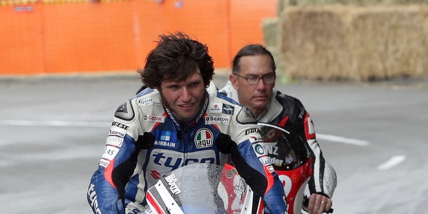 Englishman Guy Martin lets the wind through his hair during a celebrity lap on the Cemetery Circuit in Wanganui yesterday.