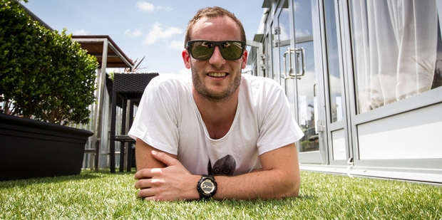 Michael Jenks, 26, won the Heineken tennis apartment. Photo / Michael Craig