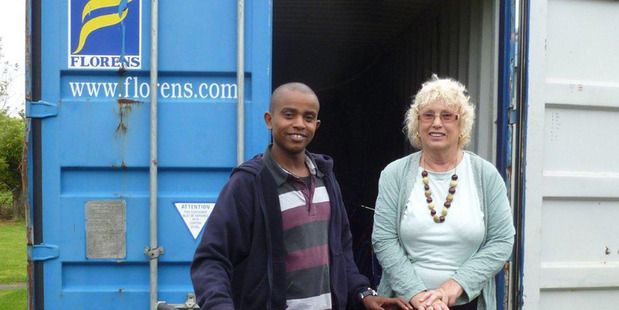 Diana Swarbrick says being given a bike has put a smile on the face of Ethiopian student Faysal Ibro.