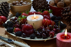 The rich reds in a platter of fresh summer fruit at Christmas lunch or dinner are evocative. Add candlelight and the festive mood is set. Photo / Meg Liptrott