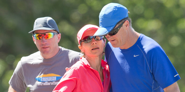 Kim Allan was helped through the last few kilometres with the support of friends and family. Photo / Greg Bowker