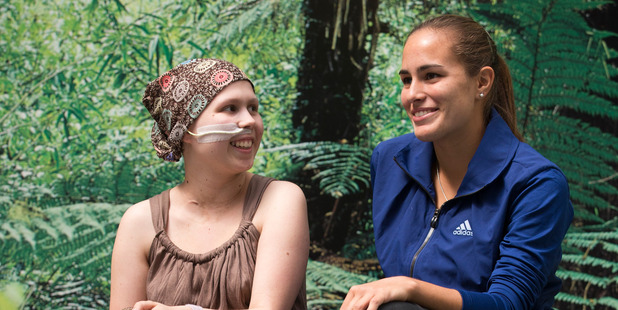 Abby, a 16 year old out patient of Starship Hospital talks with one of the stars of this years ASB Classic Tennis Open Monica Puig. Photo / Greg Bowker