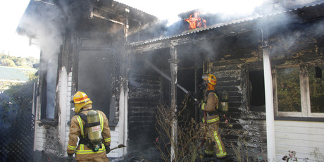 Firefighters believe the occupants were at work when the fire started. Photo/Bevan Conley.