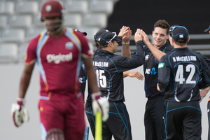 West Indies Kieron Powell leaves the crease after being bowled out by New Zealand Blackcap Mitchell McClenaghan. Photo / Greg BowkerOn