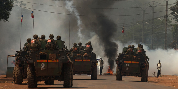 Seleka supporters protest as French troops roll into the CAR capital Bangui. Photo / AP