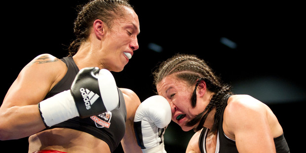 Kaikohe's Daniella Smith, left, and her daughter Talia have created history by being the first mother and daughter combination to fight on the same fight card. Daniella is pictured here during her loss to Arlene Blencowe six months ago.