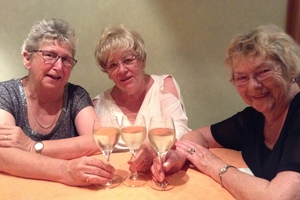 The Picton girls, from left: Aileen, Lynne and Marlene - with their glasses of Vin d'Alsace. Photo / Justine Tyerman