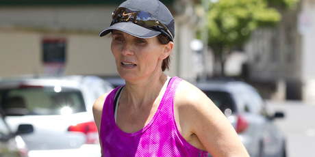 Kim Allan near the start of her attempt to beat the women's ultra-distance-without-sleep running world record at the Auckland Domain. Photo / Christine Cornege