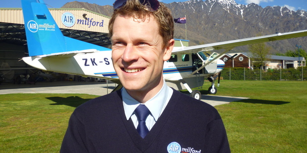 Air Milford operations manager Antony Sproull in front of the company's existing 1995 model Cessna 208 Caravan. Photo / supplied