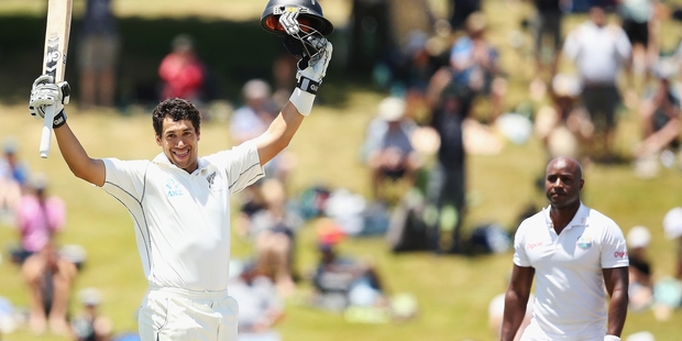 New Zealand batsman Ross Taylor salutes teammates and the Seddon Park crowd after a stirring performance to notch his third century against the West Indies and set up a 2-0 series victory. Photo / Getty Images
