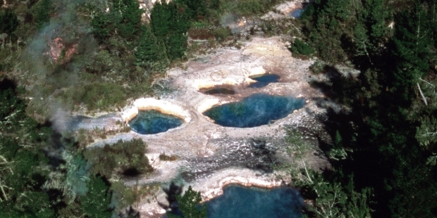 The Craters of the Moon bike trail includes steaming vents, collapsed craters and boiling mud pools.