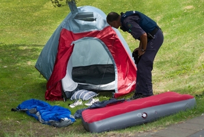 Police investigate the scene of the attack in Whakatane. Photo / Alan Gibson