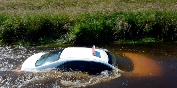George Kennedy said he had to act fast when the river took his car. Photo / ODT
