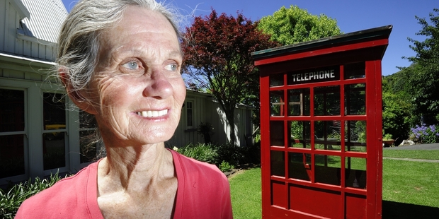 Te Puke's Gael Blaymires says she is sad to see her vintage red telephone box go but is happy to have provided a bit of fun for Trade Me punters. Photo/George Novak