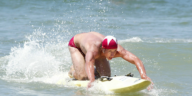 Daniel James competes in a previous Ian Porteous Memorial surf lifesaving event at Omanu Beach.