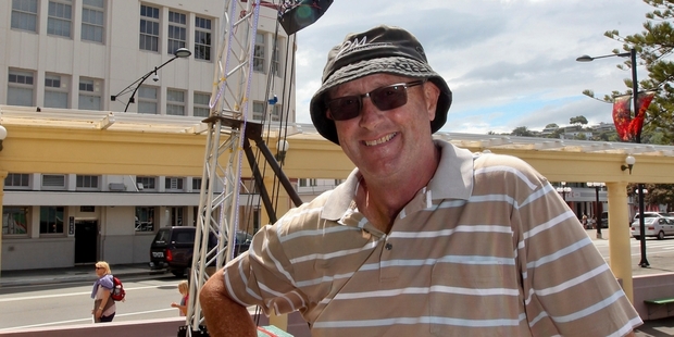 ANOTHER YEAR: Peter Mooney, Napier promoter, takes a moment's break yesterday at the Marine Parade Sound Shell, preparing for tonight's family focused New Year's Eve celebrations. He has run the event for 15 years. PHOTOS/GLENN TAYLOR HBT134407-01