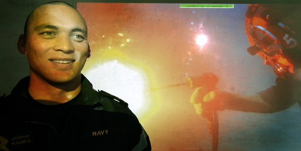 Navy diver Joshua Kauika loves the unusual sights he comes across under the water. Photo / APN