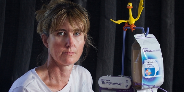 Amanda Austrin still has to be fed by a machine after contracting ciguatera poisoning two years ago.