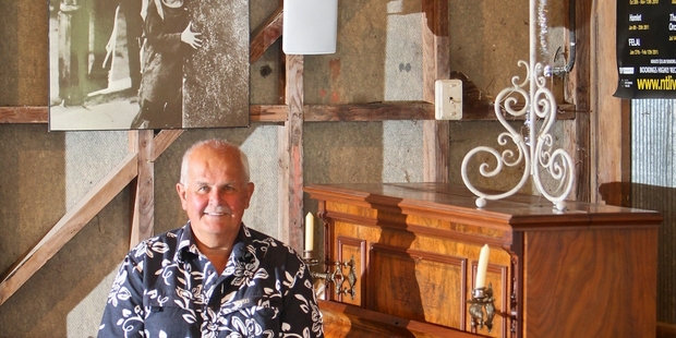 TONIC: John Kerr is pictured in his private cinema, which is used by community groups to raise money. PHOTO/GLENN TAYLOR HBT134404-02