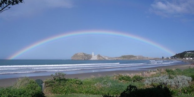 Rainbow over the lighthouse at Castlepoint.