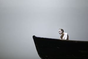Lonely: This installation in Paris earlier this year shows a pale and naked man sitting alone in a boat. Photo / Getty Images