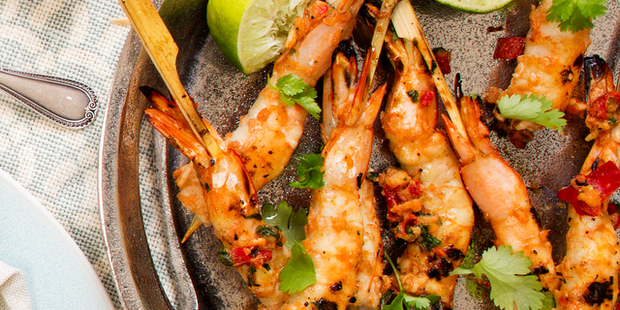 Barbecue prawn skewers with chilli lime. Photo / Babiche Martens