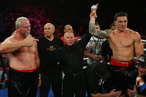 Sonny Bill Williams celebrates winning his fight against Francois Botha in their heavyweight bout. Photo / Getty Images.