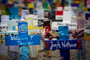 Decorated crosses on display outside the Voyager NZ Maritime Museum to commemorate the 150th anniversary of the sinking of HMS Orpheus. Photo / Natalie Slade