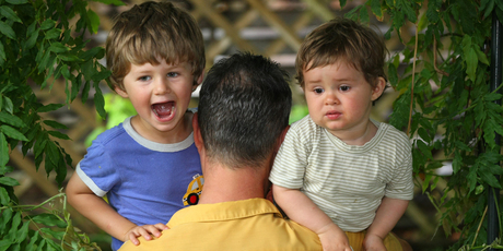 'Canvas' writer Alan Perrott with his two children Theo (3) and Aubrey 14 months. Photo / Chris Gorman