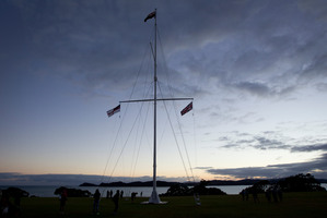 The flagpole stands on the Treaty Grounds at Waitangi during the Dawn Service to mark Waitangi Day.Photo / Sarah Ivey