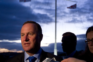 Prime Minister John Key speaking to the media on the Treaty Grounds at Waitangi. Photo / Sarah Ivey