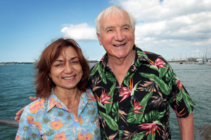 Peter Williams, with partner Heeni Phillips, has beaten prostate cancer and, below, during his illness. Photo / Doug Sherring