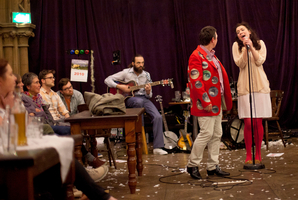 Melody Grove, playing Prudencia Hart in a spine-chilling Scottish tale, sings with David McKay (centre) and Alastair Macrae on guitar. Photo / Drew Farrell