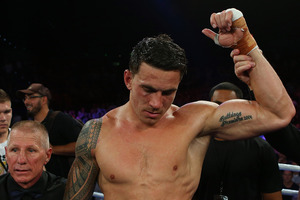 Sonny Bill Williams hung on for a victory over Francois Botha after two rounds were cut from the fight. Photo / Getty Images