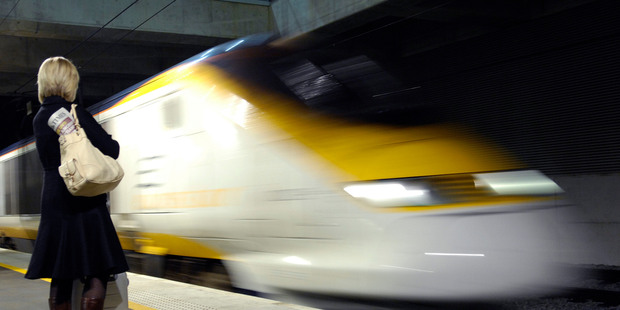 A passenger waits as a Eurostar train arrives at Ebbsfleet, Kent, England. Photo / Bloomberg